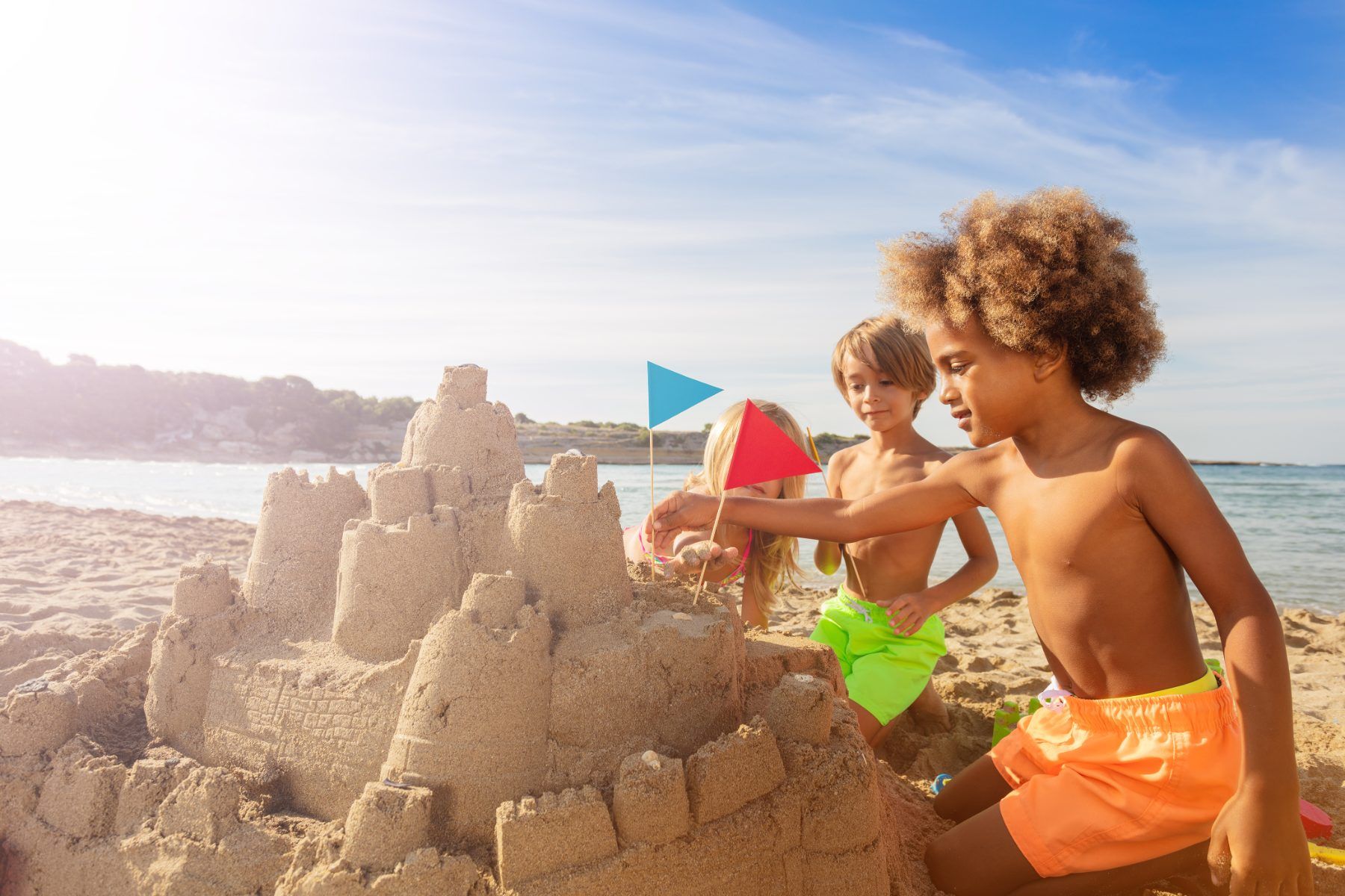 Kids building a sand castle